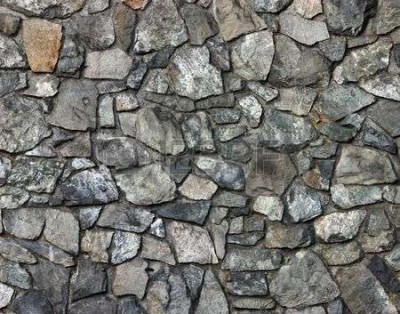 3844095-rock-wall-texture-background-rocks-are-an-assortment-of-colours-shapes-and-sizes.jpg